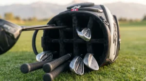 Side view of a premium golf bag displaying large apparel and storage pockets typical of the best staff golf bags on the market.
