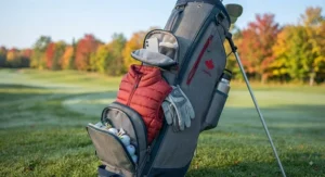 An organized women's golf stand bag showing multiple storage pockets for extra layers and golf gear during Canadian fall golf.