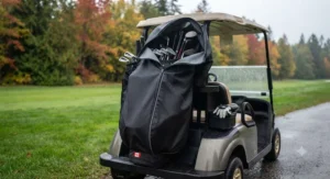 Full view of a golf bag rain cover for cart bags protecting gear during a wet autumn golf game in Canada.