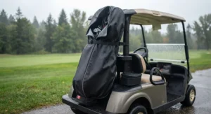 Golf bag rain cover for cart bags strapped securely onto a power cart during a rainy round in Canada.