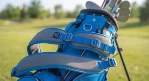 Close-up view of the adjustable, padded dual strap system on a junior golf stand bag for comfortable walking during junior tournaments.