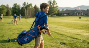 Young player wearing an ergonomic junior golf bag with comfortable padded straps during practice.